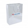 Sac papier luxe blanc finition vernis plastifié.