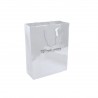 Sac papier luxe blanc finition vernis plastifié.